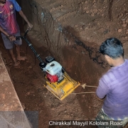 Pipe laying along Mayyil KRFB Road- Layer by Layer earth compaction