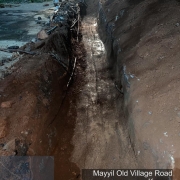 Pipe laying along Mayyil KRFB Road- Layer by Layer earth compaction