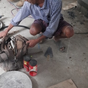 Contractor cum labourer engaged in erection of pump