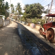 Bitumen emulsion (RS) sprayed over WMM layer at Kudappanakunnu-Krishna Nagar road.