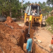 Laying of 600mm DI pipe near Karumbumkonam
