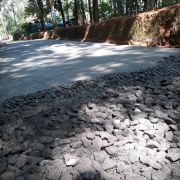 Pazhavara NSS road restoration - bed course laying C.C1:4:8 in progress