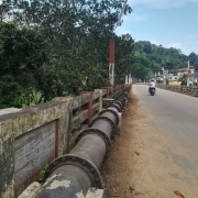 Pipe laying work  over Athikkayam bridge