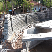 Solid block work construction for compound wall near backside of admin building