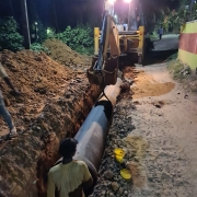 Laying of 600mm DI pipe at Karumbumkonam towards Kariyam junction.