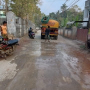 Water sprinkling to prevent dust at WMM laid over kudappanakunnu road