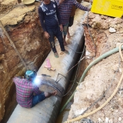 Laying and welding of joint of 914mm MS pipe @ Kusavarkal road